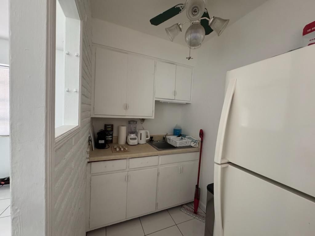 Photo of 1141 E Blue Heron Boulevard #5, Riviera Beach, FL 33404 (MLS # R11121436)