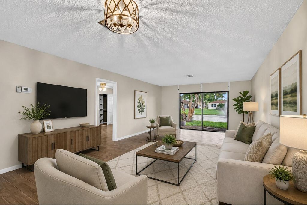 Photo of 4893 Palm Hill Drive, West Palm Beach, FL 33415 (MLS # B26038764)