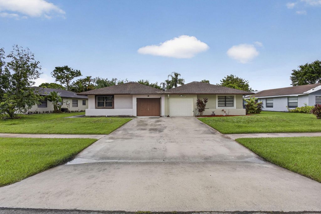 Photo of 4893 Palm Hill Drive, West Palm Beach, FL 33415 (MLS # B26038764)