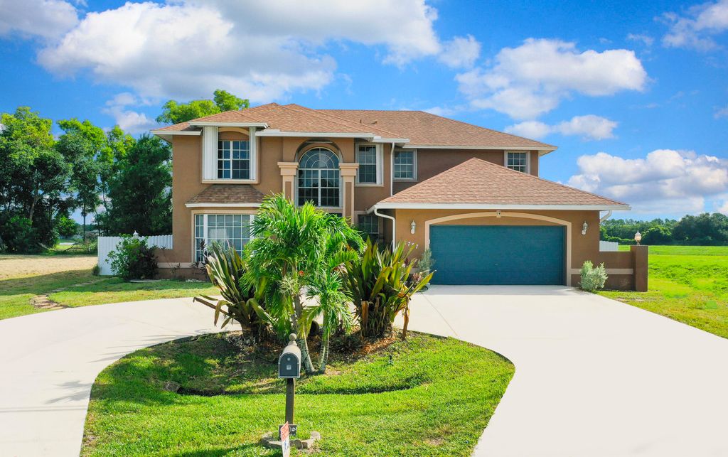 Photo of 2757 SW Ann Arbor Road, Port Saint Lucie, FL 34953 (MLS # R11111073)