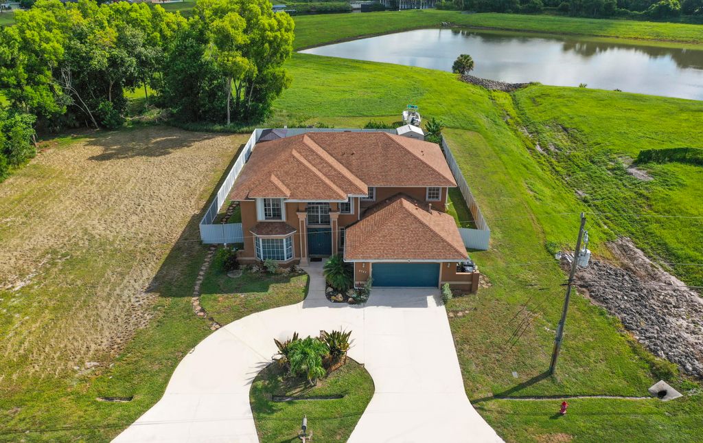 Photo of 2757 SW Ann Arbor Road, Port Saint Lucie, FL 34953 (MLS # R11111073)