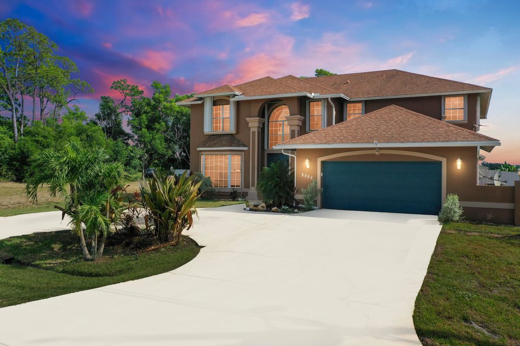 Photo of 2757 SW Ann Arbor Road, Port Saint Lucie, FL 34953 (MLS # R11111073)