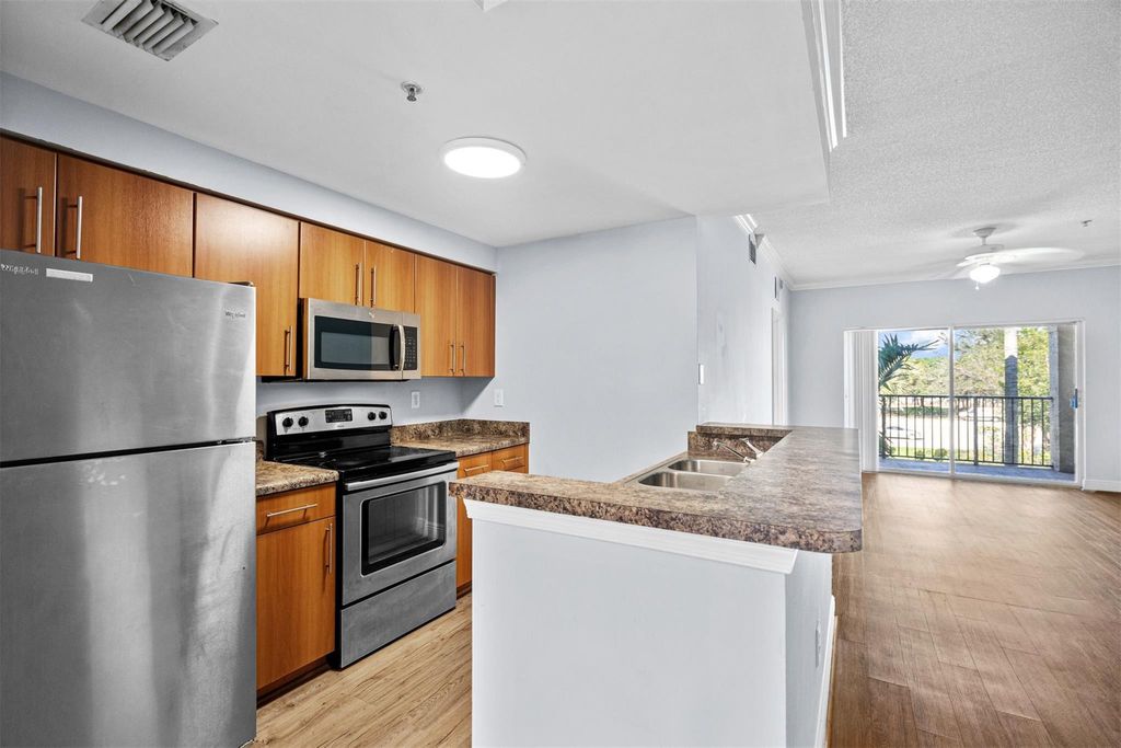 Photo of 5880 W Sample Road #307, Coral Springs, FL 33067 (MLS # F10555749)