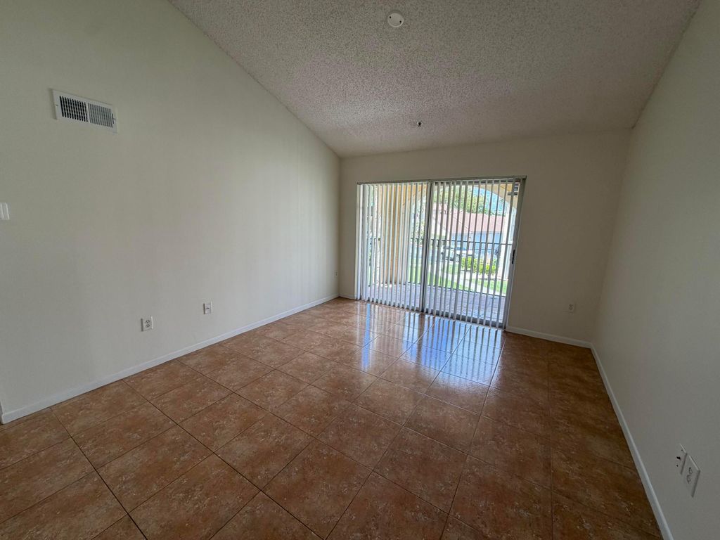 Photo of 1749 Village Boulevard #208, West Palm Beach, FL 33409 (MLS # B26030500)