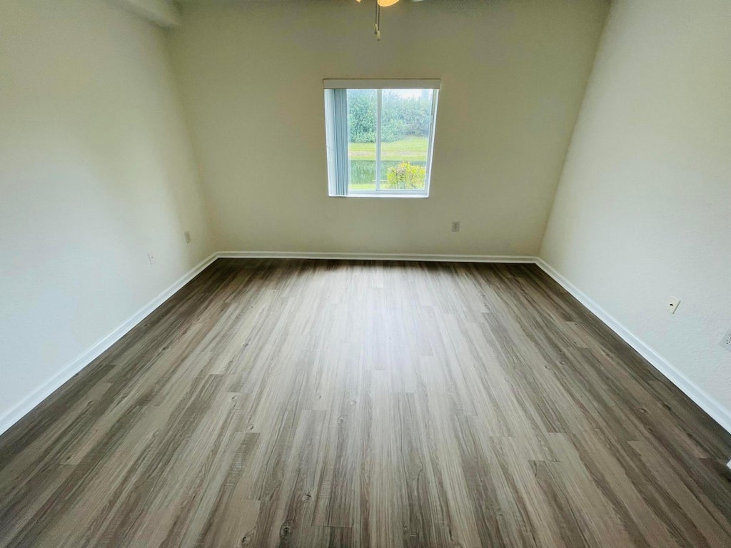 Photo of 1055 Golden Lakes Boulevard #212, West Palm Beach, FL 33411 (MLS # B26045243)