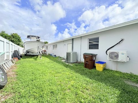 Tiny photo for 1861 Caribbean Road W, Lake Clarke Shores, FL 33406 (MLS # R11128714)