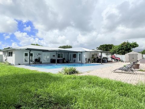 Tiny photo for 1861 Caribbean Road W, Lake Clarke Shores, FL 33406 (MLS # R11128714)