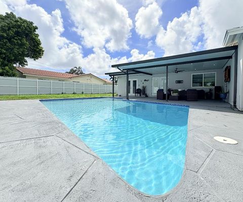Tiny photo for 1861 Caribbean Road W, Lake Clarke Shores, FL 33406 (MLS # R11128714)