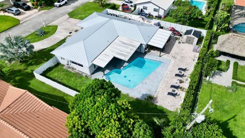 Tiny photo for 1861 Caribbean Road W, Lake Clarke Shores, FL 33406 (MLS # R11128714)