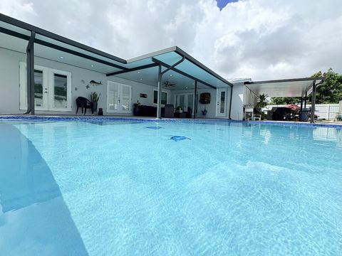 Tiny photo for 1861 Caribbean Road W, Lake Clarke Shores, FL 33406 (MLS # R11128714)