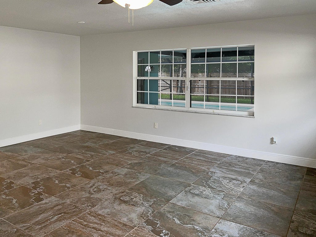 Photo of 2927 Sherwood Lane, Fort Pierce, FL 34982 (MLS # R11034726)