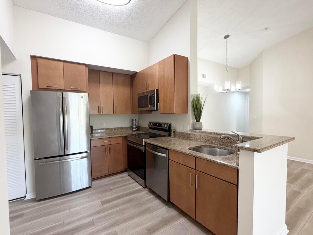 Photo of 6968 SW 39th Street #F302, Davie, FL 33314 (MLS # B26077141)