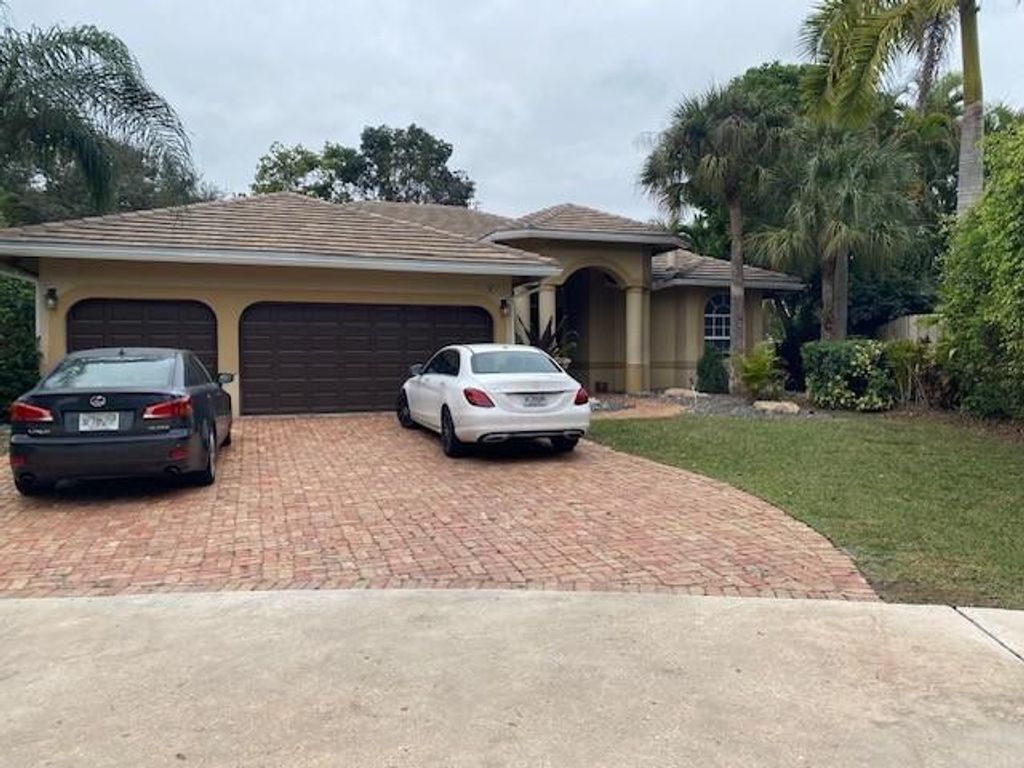 Photo of 7057 NW 67th Terrace, Parkland, FL 33067 (MLS # F10551063)