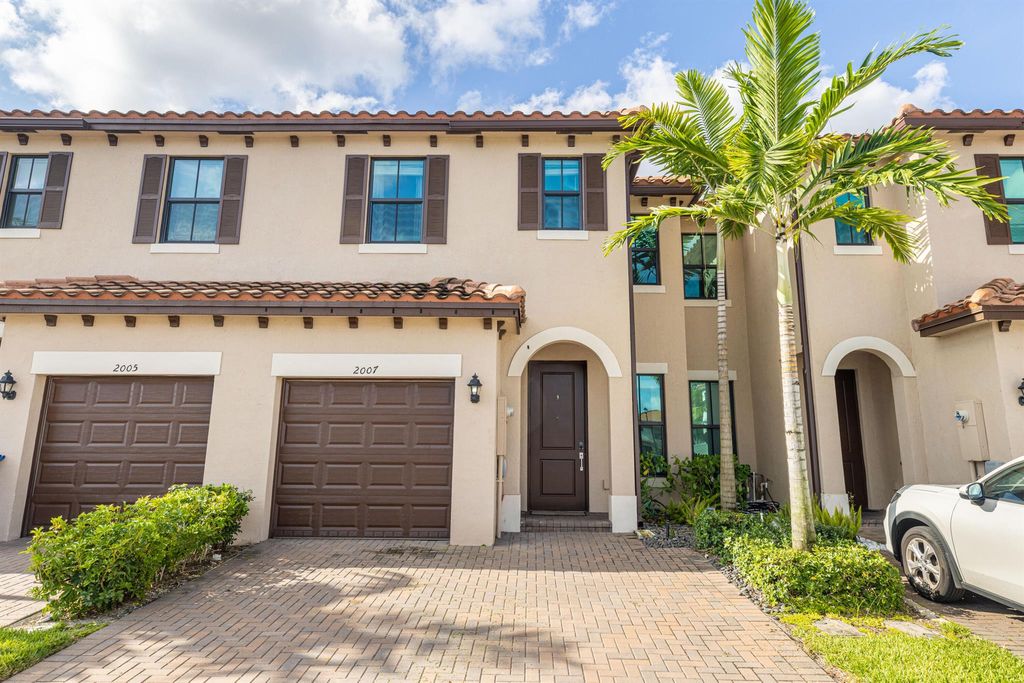 Photo of 2007 Oysterwood Lane, Riviera Beach, FL 33410 (MLS # R10917045)