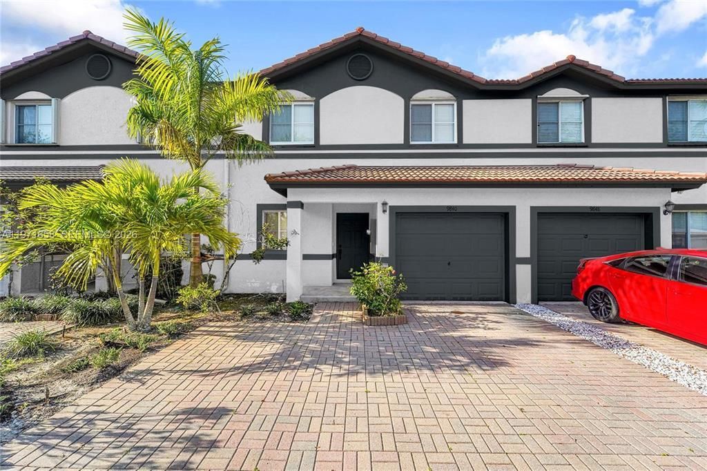 Photo of 9840 NW 19th Place, Sunrise, FL 33322 (MLS # B26021082)
