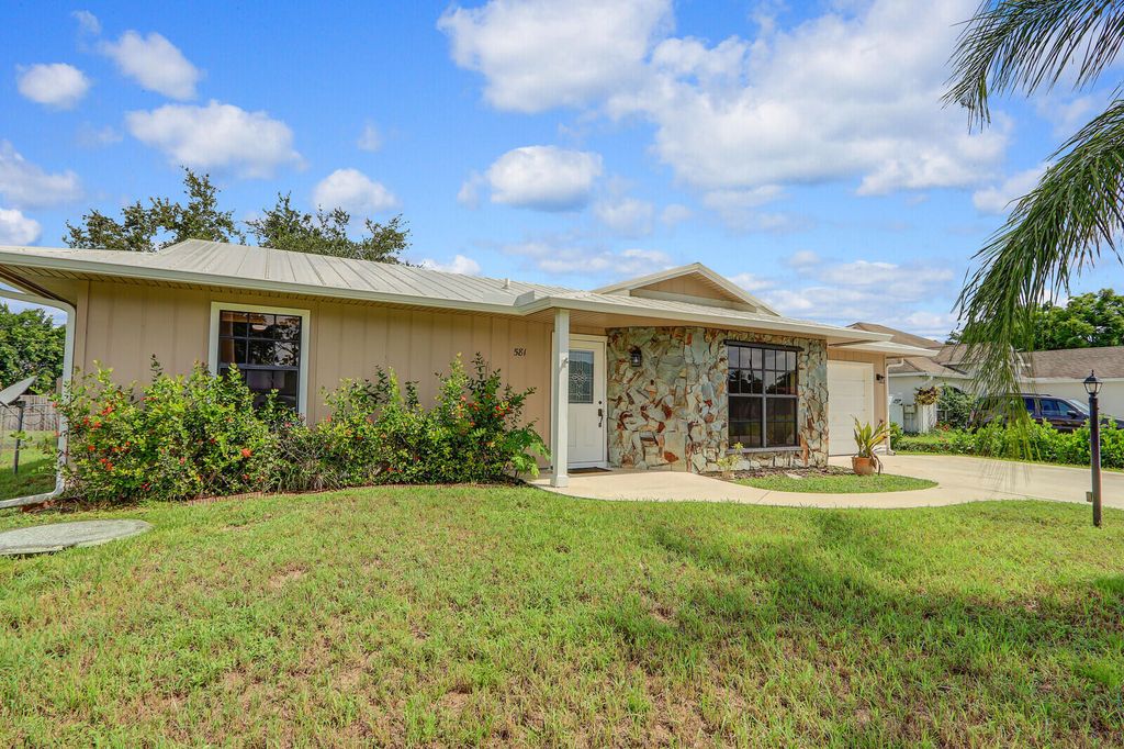 Photo of 581 SW Banks Terrace, Port Saint Lucie, FL 34953 (MLS # R11014794)