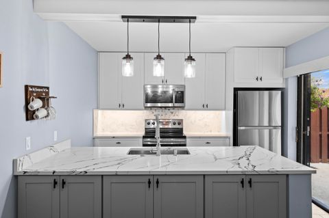 Photo of 3100 SW Sunset Trace Circle, Palm City, FL 34990 (MLS # B26001316)