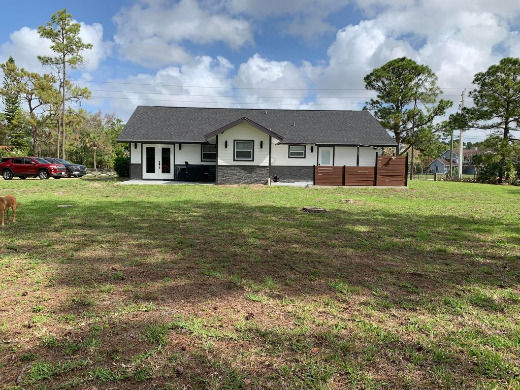 Photo of 14566 Temple Boulevard, The Acreage, FL 33470 (MLS # B26011208)
