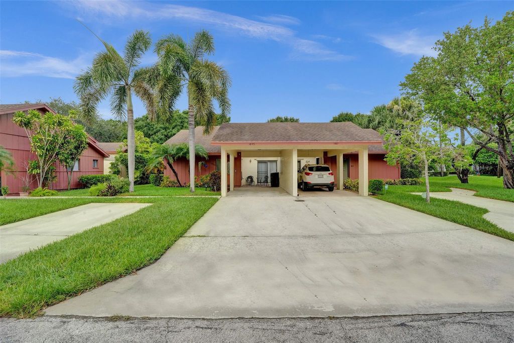 Photo of 1855 Tamarind Lane, Coconut Creek, FL 33063 (MLS # F10450416)