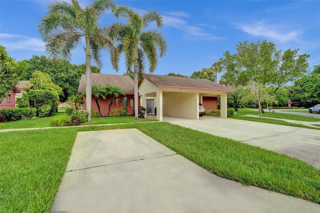 Photo of 1855 Tamarind Lane, Coconut Creek, FL 33063 (MLS # F10450416)
