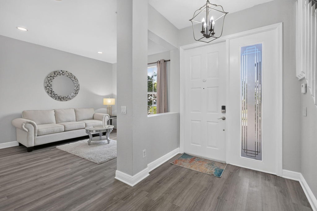 Photo of 5010 Nautica Lake Circle, Greenacres, FL 33463 (MLS # B26083170)