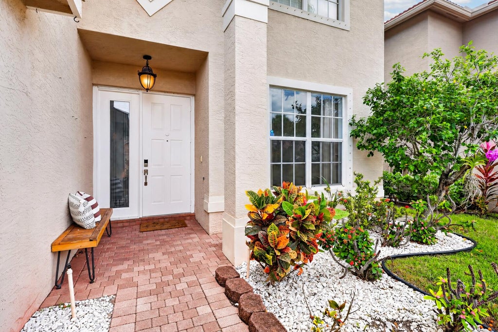 Photo of 5010 Nautica Lake Circle, Greenacres, FL 33463 (MLS # B26083170)