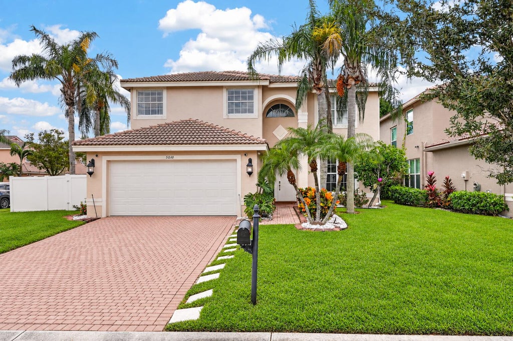 Photo of 5010 Nautica Lake Circle, Greenacres, FL 33463 (MLS # B26083170)