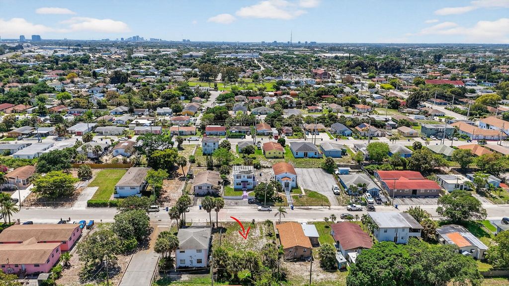 Photo of 1204 W 35th Street, Riviera Beach, FL 33404 (MLS # B26011949)