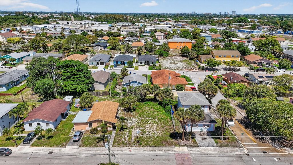 Photo of 1204 W 35th Street, Riviera Beach, FL 33404 (MLS # B26011949)