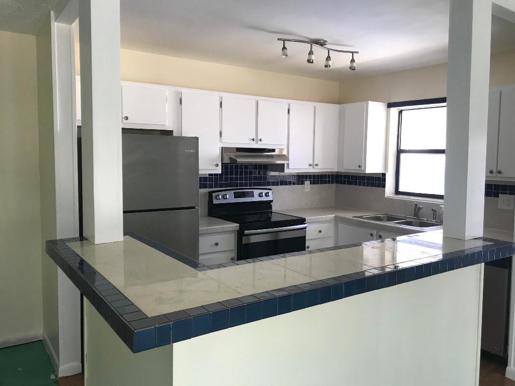 TOWN & COUNTRY ESTATES CONDO - Residential Lease