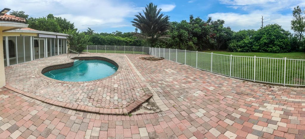 Photo of 11550 Sundance Lane, Boca Raton, FL 33428 (MLS # R11108181)