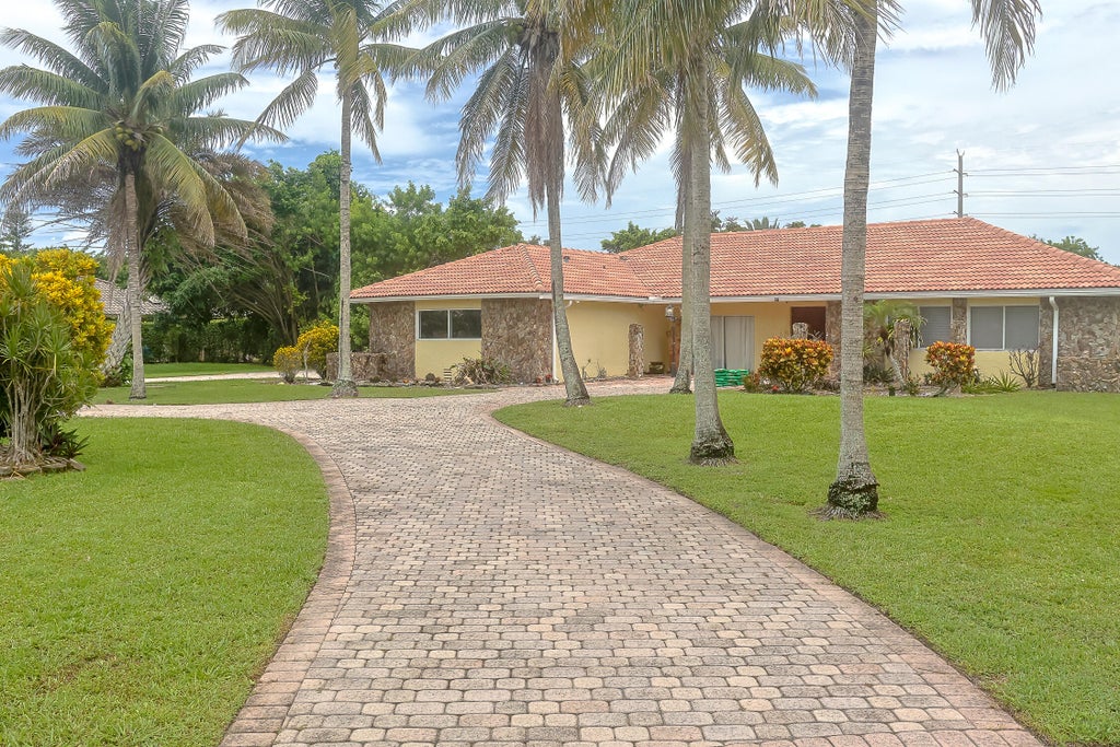 Photo of 11550 Sundance Lane, Boca Raton, FL 33428 (MLS # R11108181)