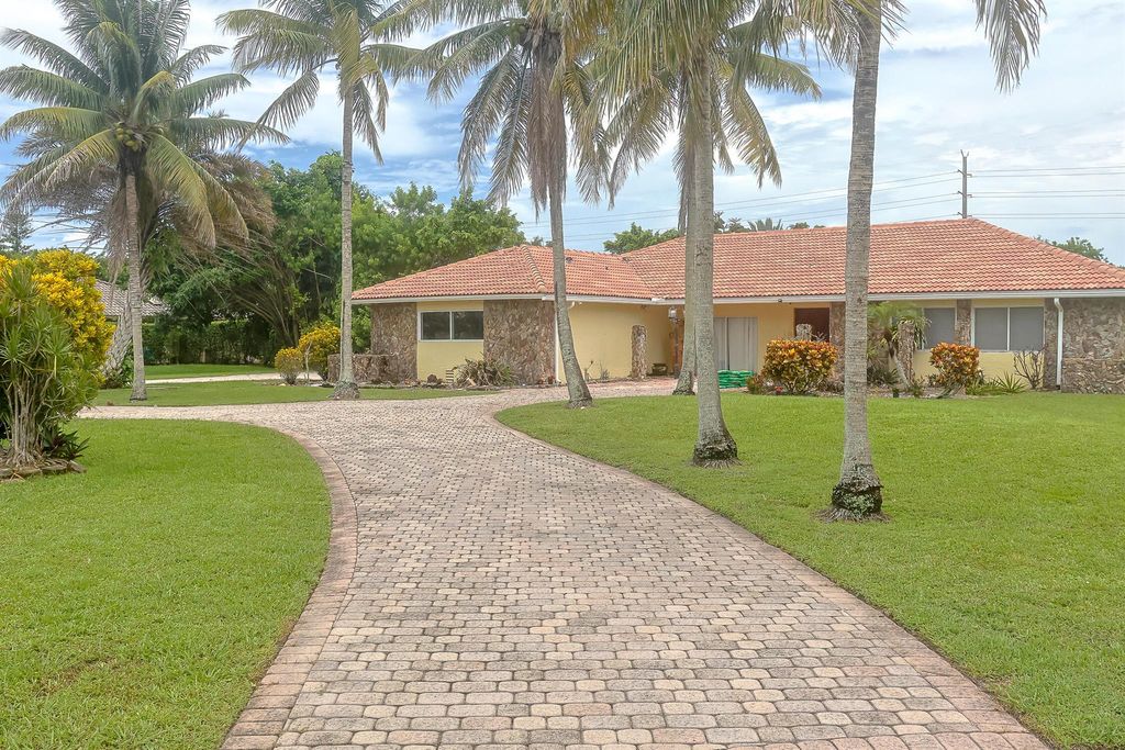 Photo of 11550 Sundance Lane, Boca Raton, FL 33428 (MLS # R11108181)