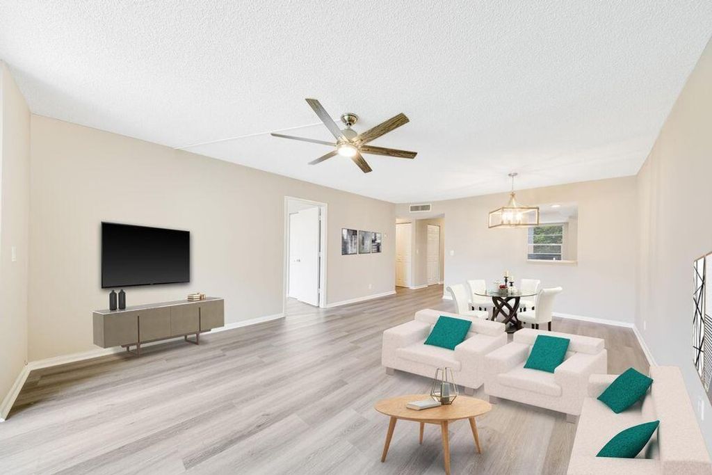 Photo of 27 Abbey Lane #304, Delray Beach, FL 33446 (MLS # R11152459)