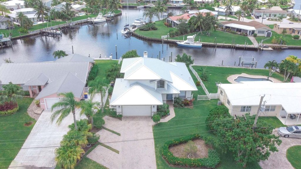 Photo of 1694 SW Boatswain Place, Palm City, FL 34990 (MLS # B26026977)