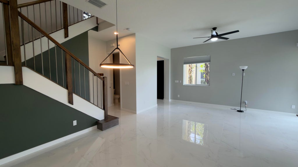 Photo of 761 PIONEER Way, Royal Palm Beach, FL 33411 (MLS # B26079504)