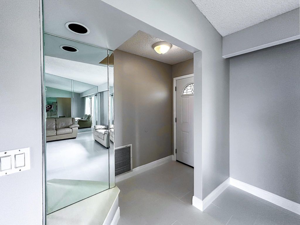 Photo of 2433 SE Hallahan Street, Port Saint Lucie, FL 34952 (MLS # R11133847)