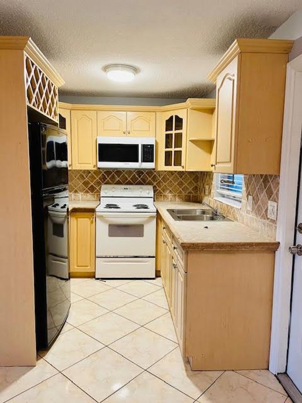 Photo of 4491 NW 1st Terrace, Deerfield Beach, FL 33064 (MLS # R11067411)