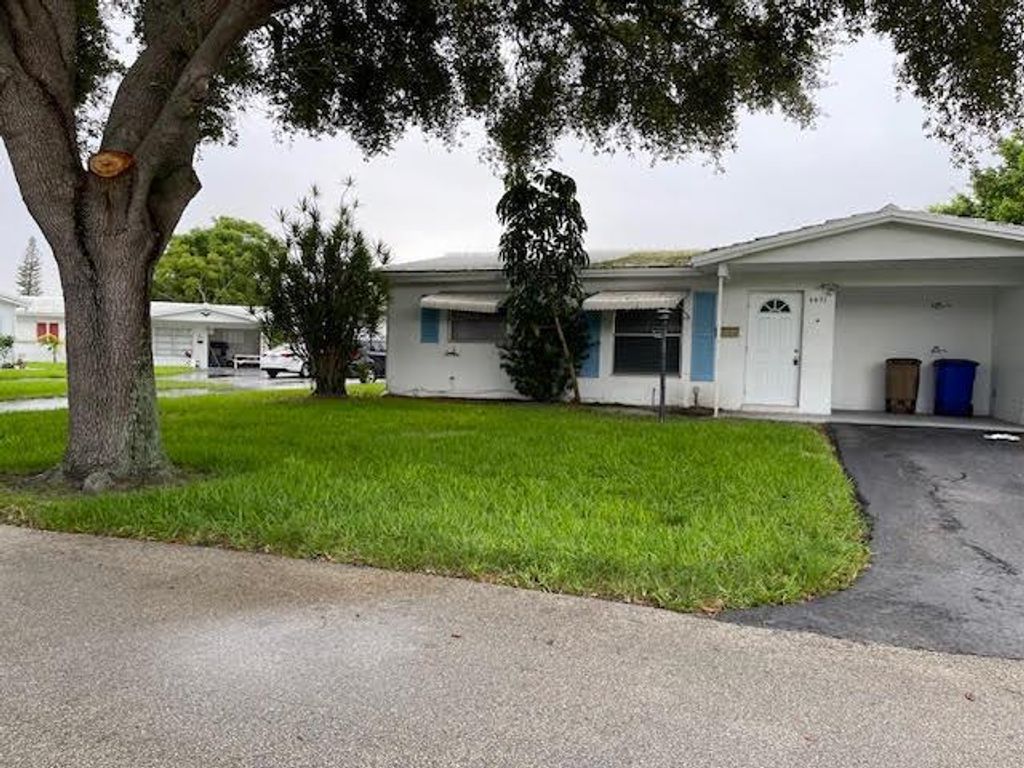 Photo of 4491 NW 1st Terrace, Deerfield Beach, FL 33064 (MLS # R11067411)