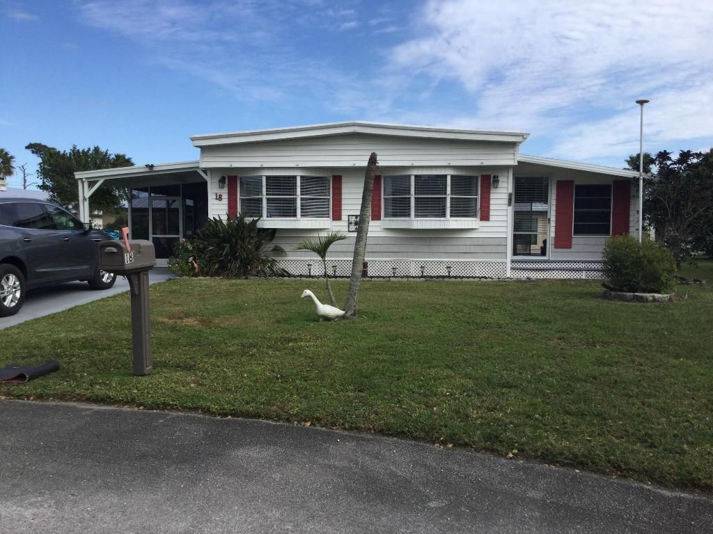 Photo of 18 Madrid Lane, Port Saint Lucie, FL 34952 (MLS # R11050239)