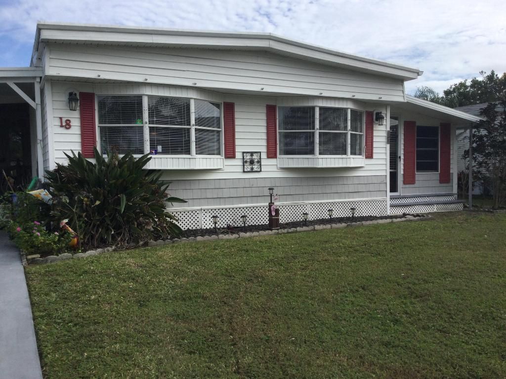 Photo of 18 Madrid Lane, Port Saint Lucie, FL 34952 (MLS # R11050239)