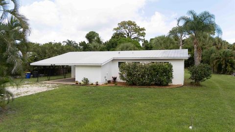Photo of 1849 NW Pine Tree Way, Stuart, FL 34994 (MLS # R11127225)