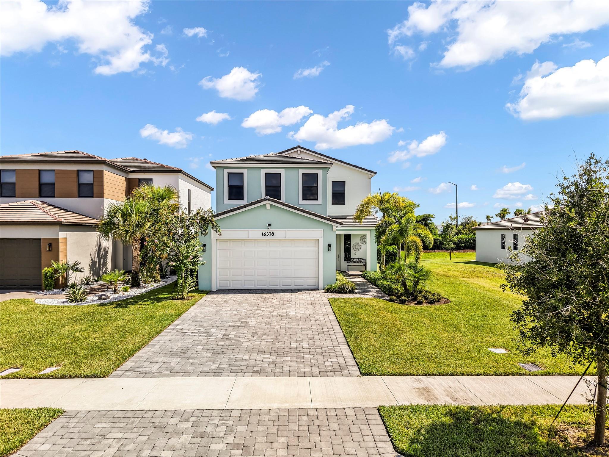 Don’t miss out on this stunning five-bedroom, three-and-a-half-bathroom two-story Single Family home, featuring premium upgrades and in immaculate, nearly-new condition—absolutely move-in ready! Enjoy elegant ceramic tile floors with a hardwood flooring look. Located in a gated community, residents have access to resort-style amenities, including two swimming pools (one for adults and one for children), a water park and play area, walking paths, and a state-of-the-art fitness center. The rapidly growing neighborhood offers convenient access to major shopping destinations and fine dining restaurants. Easy to view—property is on SUPRA.