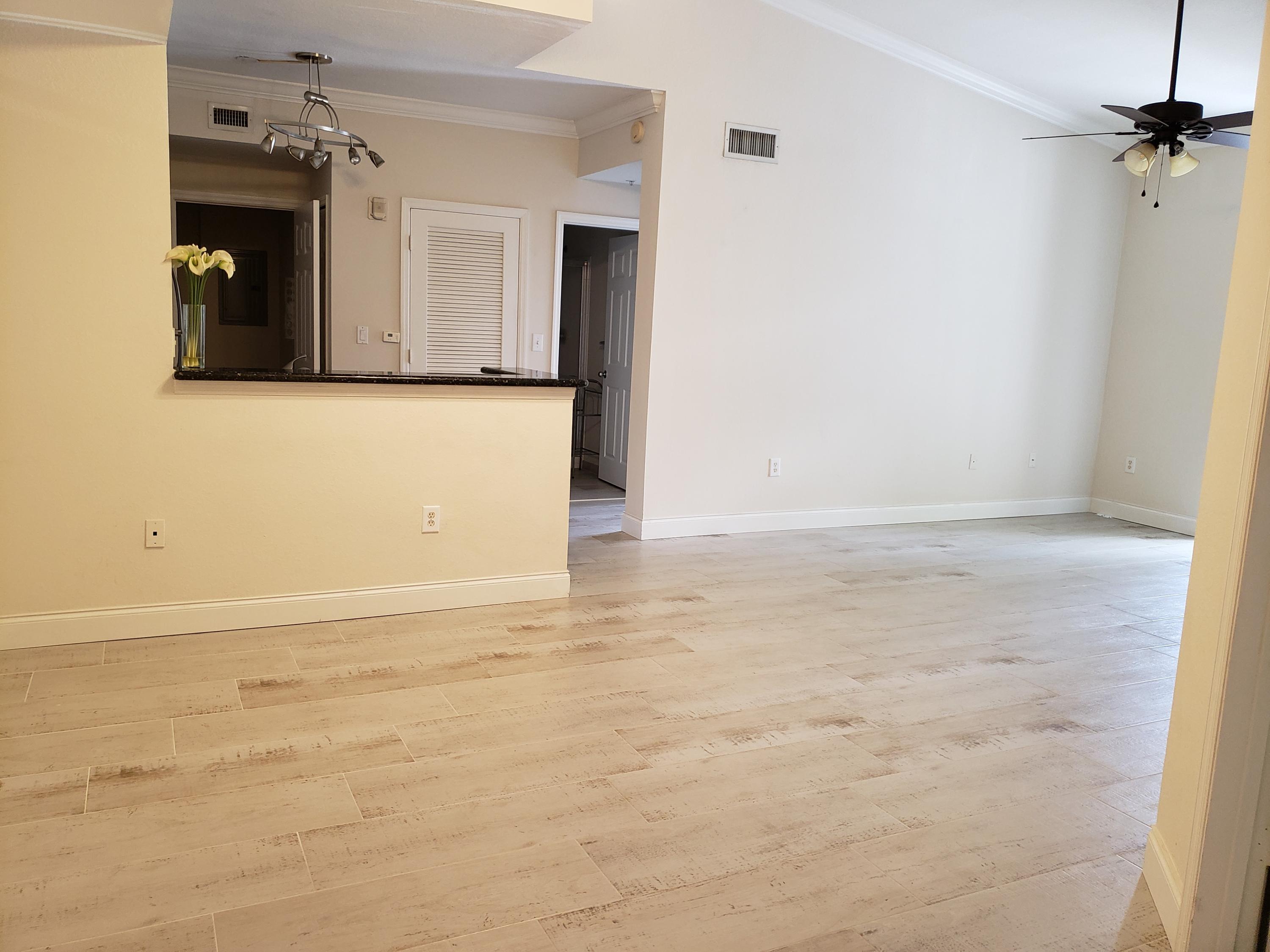 Absolutely gorgeous second floor 2 bedroom/2 bath condo. All tile, stainless steel appliances, granite countertop, front loader washer/dryer. The unit features an open floor plan, plenty of closet space (walk in closet in each bedroom). Small storage unit included. Community features gated access, gym, pool and meeting area. Quick and easy access to major highways, beach, entertainment.. Rent with confidence: property is covered with a service contract