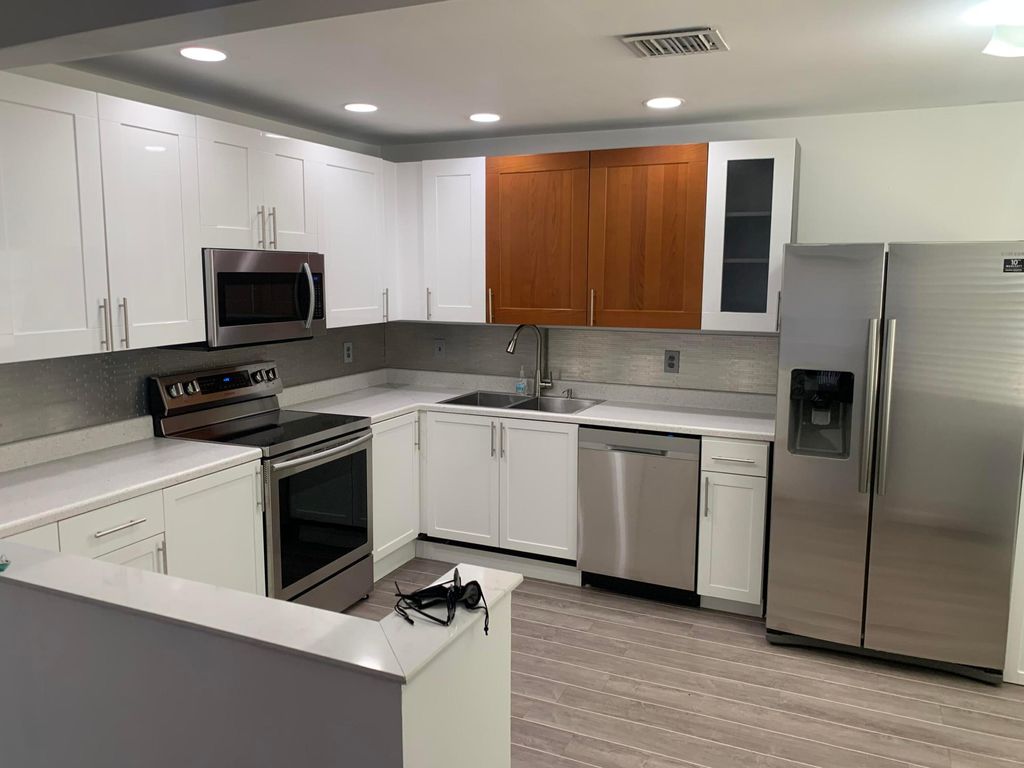 Photo of 4968 Alder Drive #D, West Palm Beach, FL 33417 (MLS # B26021744)
