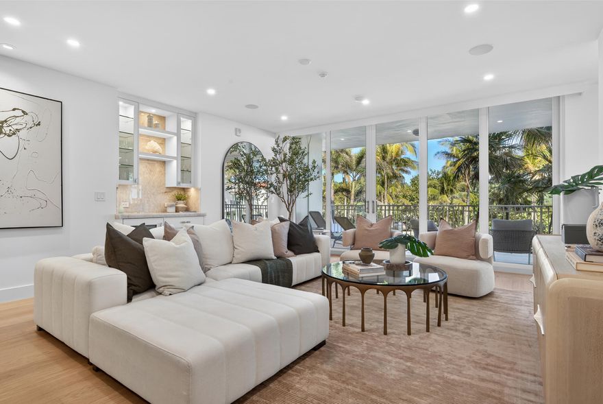 Experience a new benchmark of Palm Beach sophistication at 100 Royal Palm Way.  This sprawling 2,267 SF residence has been masterfully gut renovated to the highest standards, offering a seamless blend of modern elegance and coastal tranquility.  No detail was spared, from the pale wide-plank wood flooring that flows throughout the light-filled, open floor plan to the expansive balcony offering serene ocean views.  The gourmet kitchen is a chef's dream, anchored by exquisite Taj Mahal marble and a premium Wolf and Sub-Zero appliance suite.  Both bedrooms and den offer refined comfort, while the spa-like bathrooms feature double vanity, glass enclosed showers, and a deep soaking tub.  Complete with impact glass throughout and world class building amenities - including a 24/7 doorperson, gym, and pool - this is the ultimate 'move-in-and-enjoy" opportunity just steps from the ocean and the best of Palm Beach!