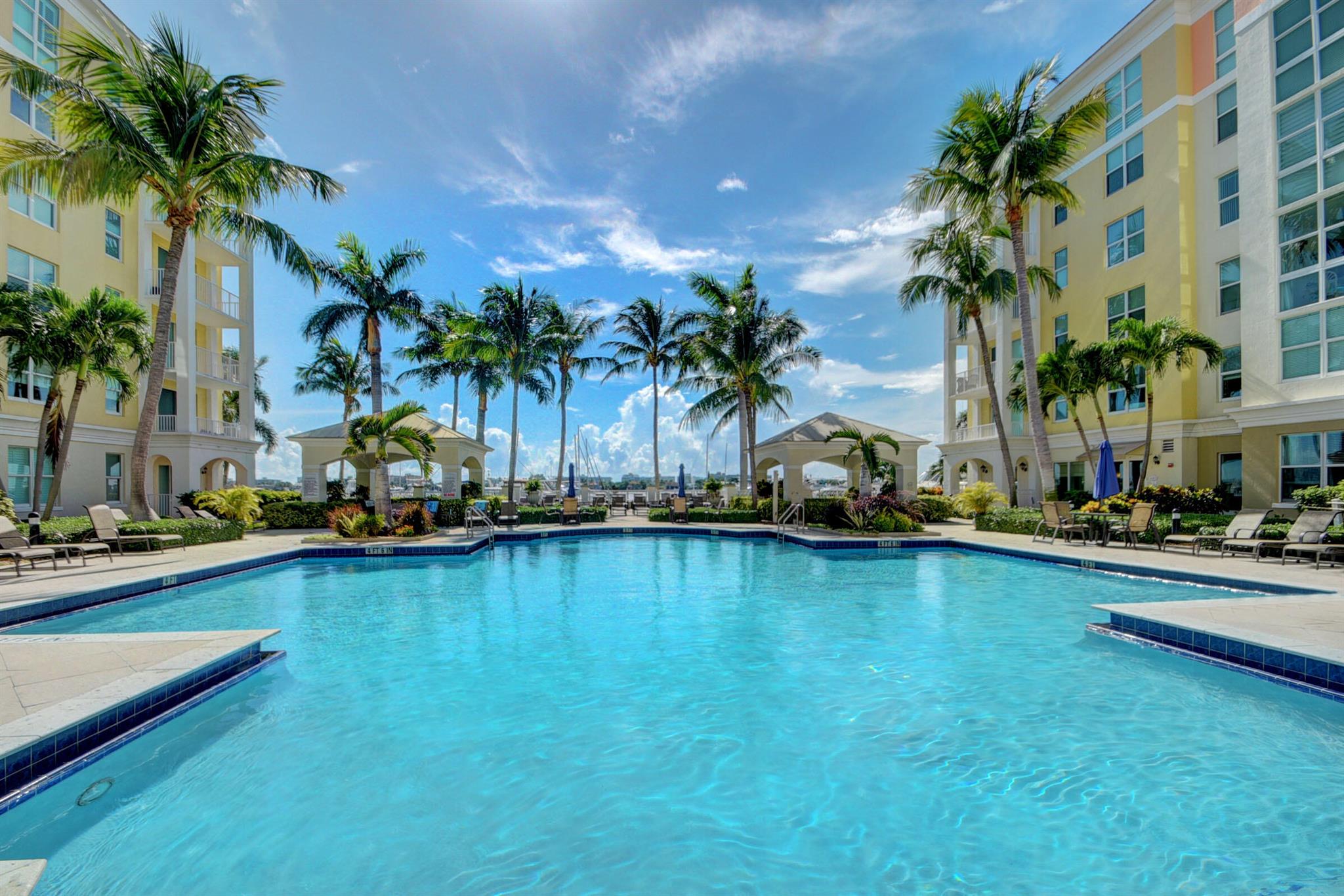 OFFERED UNFURNISHED FOR ANNUAL RENT. Impeccable cozy condo with one car garage and guest garage spaces available. King size bed and two twin beds in guest bedroom. Bring your suitcase and enjoy all the amenities this complex offers: two heated pools and spa, fitness room, sauna, business room, a well appointed clubhouse on the water, billiards room, and valet parking for your visitors. Minutes from the beach, Plaza del Mar shopping plaza, The Ice Cream Club, Palm Beach Airport, charming Worth Ave., Norton Museum, restaurants, Tennis Center, Water Sports, and Golf courses.