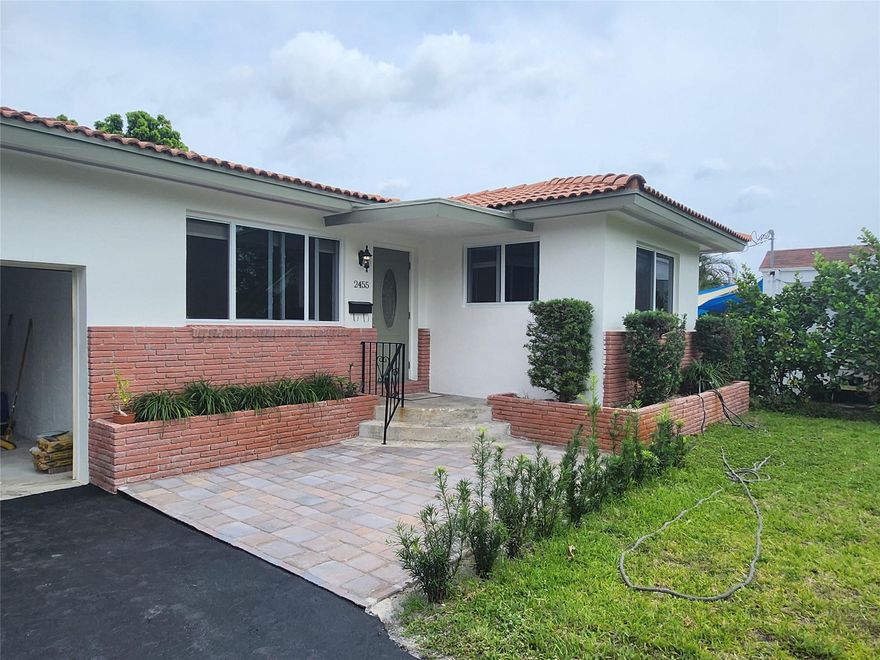 Step into this beautifully renovated 2-bedroom, 2-bathroom residence in Hollywood Little Ranches, where elegance meets practical living. This home features polished hardwood floors throughout, impact-resistant windows for peace of mind, and a modern kitchen that caters to both culinary enthusiasts and busy professionals. Enjoy the expansive backyard, perfect for entertaining or a quiet evening outdoors. Located minutes from Hollywood Young Circle, this property offers a blend of suburban tranquility and city conveniences. Experience the lifestyle you deserve. Schedule your visit and find your future home today! Welcome to an abode where comfort meets sophistication in Hollywood Little Ranches. This 2-bedroom, 2-bath sanctuary offers sleek hardwood floors, high-impact windows, and a functional kitchen ready to meet your culinary needs. Step into the expansive backyard, a perfect canvas for your outdoor activities and gatherings. Situated just moments from the cultural pulse of Hollywood Young Circle, this home offers an ideal balance of tranquility and access to urban conveniences. Discover why this isn't just a place to live—it's a place to thrive. Experience it today!