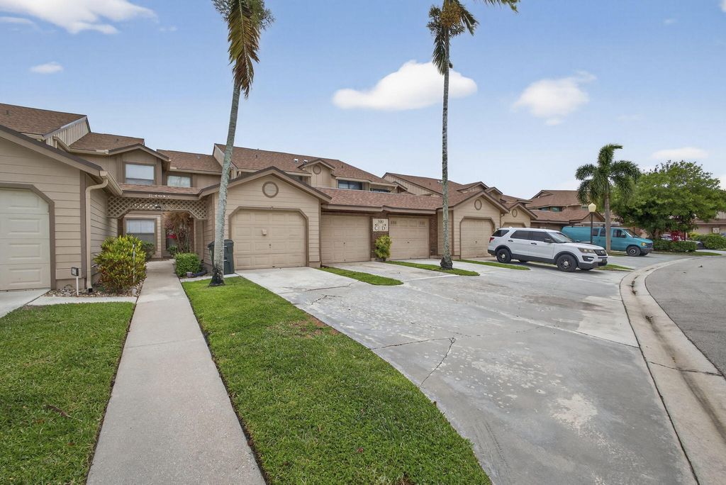 Photo of 500 Crosswinds Drive #C1, Greenacres, FL 33413 (MLS # B26012316)