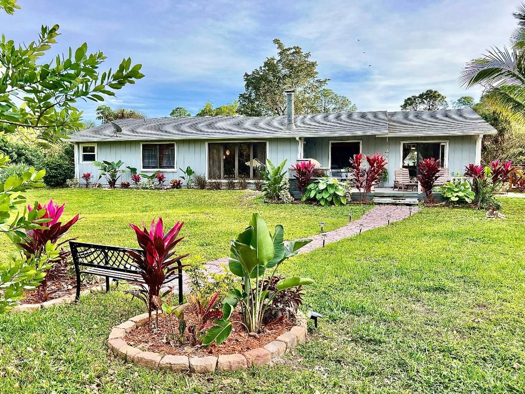 Photo of 12809 Sunset Boulevard, The Acreage, FL 33411 (MLS # R10946086)